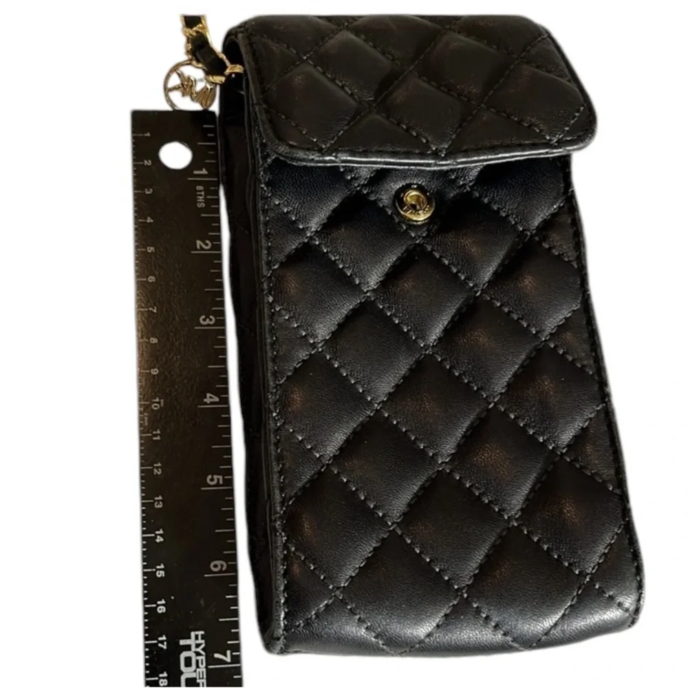Micheal Kors Sloane black quilted leather crossbody gold hardware snap closure